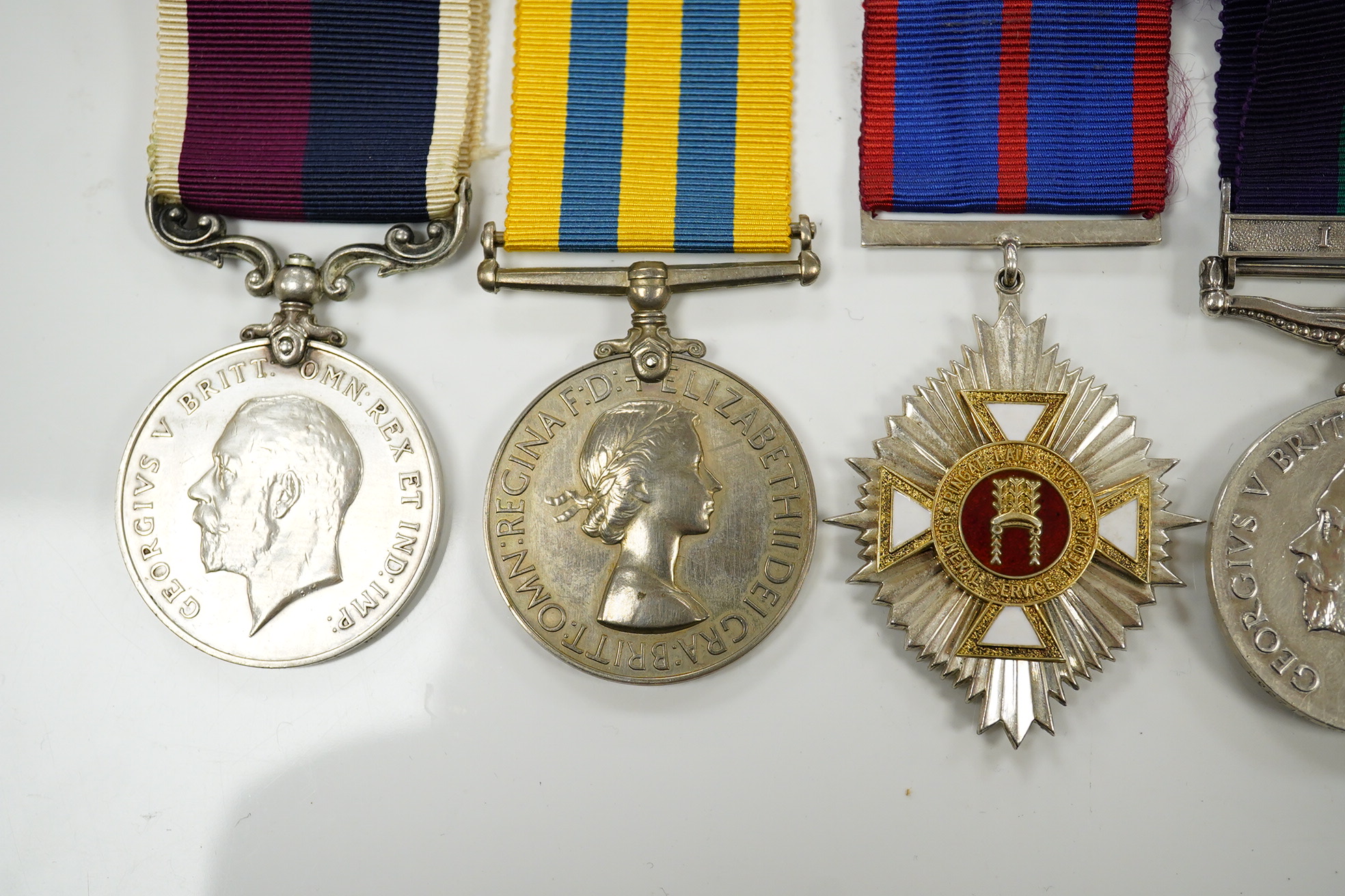 Seven military medals, including; a WWII medal group including the 1939-1945 Star, the France and Germany Star and the 1939-1945 Medal, a George V General Service Medal with a bar for Iraq awarded to GNR. G. Fuller R.A.